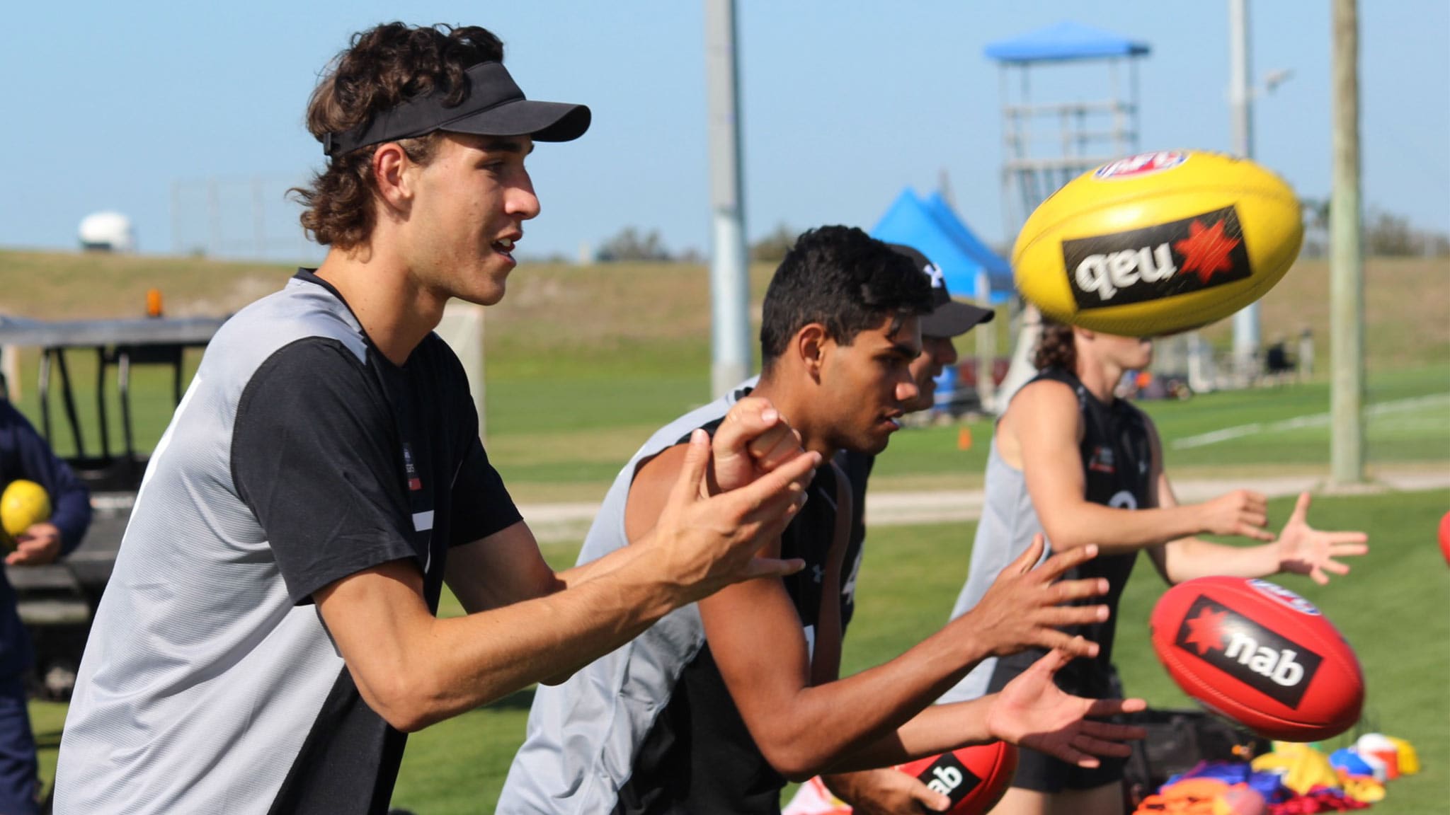 king-max-300.jpg Max King fires out a handball in Academy training in Florida - AFL Academy,AFL,Max King,Draft